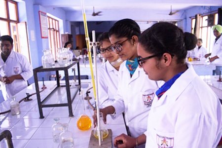 Future chemists perfecting the art of volumetric titrations