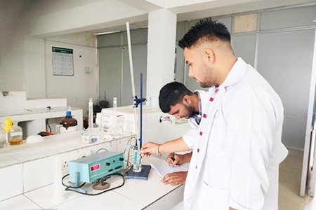 Future chemists perfecting the art of volumetric titrations